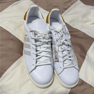 Kith White and Gold Sneakers